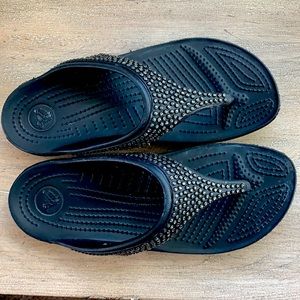 Black Crocs flip flops size 7